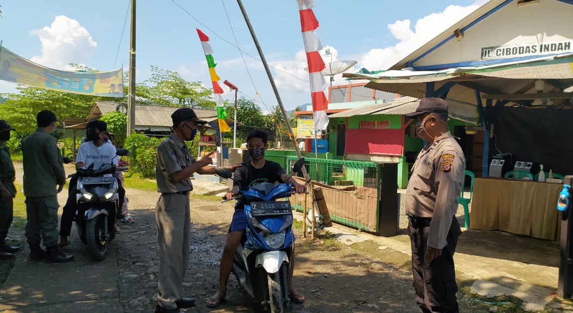 Kanit Binmas Bersama Forkopimcam Surian Sosialisasi AKB, Himbau Warga Ikuti Protokal Kesehatan Covid-19